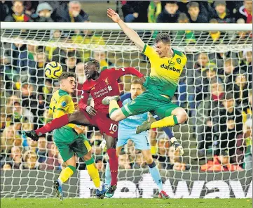  ?? REUTERS ?? Liverpool's Sadio Mane (centre), returning from injury suffered in January, scored a 78th minute winner against Norwich on Saturday.