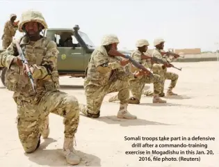  ??  ?? Somali troops take part in a defensive drill after a commando-training exercise in Mogadishu in this Jan. 20, 2016, file photo. (Reuters)