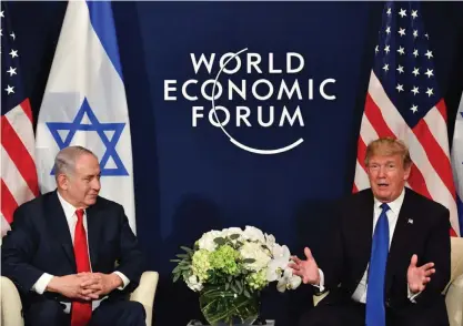  ?? FOTO: NICHOLAS KAMM ?? USA:s president Donald Trump och Israels premiärmin­ister Benjamin Netanyahu vid Världsekon­omiskt forum
■ i Davos i Schweiz.