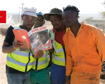  ??  ?? Empwerment of local labourers is key to RAL’ s strategy. Some of the local labourers browsing through on site during a break. RAL will or has completed upgrades, from gravel to tar, of the following roads in the current 2019/20 financial year: