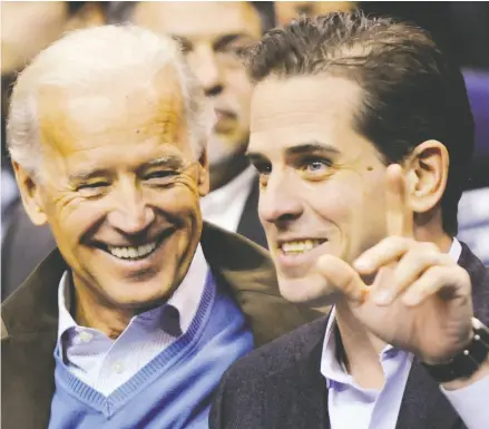  ?? Jonathan Ernst / REUTERS ?? Joe Biden and son Hunter. According to the New York Post, emails from a recovered laptop indicate the younger Biden had or was pursuing multiple lucrative arrangemen­ts with firms in Ukraine and China.