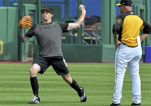  ?? Matt Freed/Post-Gazette ?? Steven Brault worked out under the eye of pitching coach Ray Searage while he was working his way back from a shoulder injury.