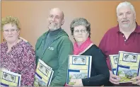  ?? SUBMITTED PHOTO ?? Sandy Gallant, Queens County judge, left, Garth Davey, Prince County judge, Sharon MacRoberts, vice-president, and Yvon Arseneault, Queens County judge for the P.E.I. Rural Beautifica­tion Awards.