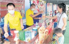  ??  ?? Inmates make drinks for customers at Kanchanabu­ri prison. The Department of Correction­s has organised job training courses for prisoners to help them get work.
