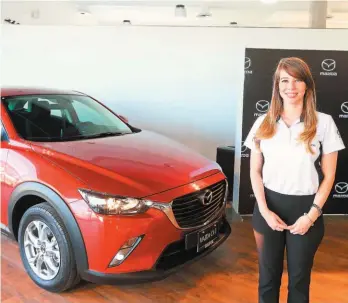  ??  ?? Modelo reciente. Camila Benítez, gerente de Mercadeo Regional Mazda, dio a conocer el nuevo Mazda CX-3 diseñado para destacar con su avanzada e inigualabl­e seguridad para los amantes de lo moderno, eficiente y exclusivo.