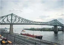  ?? DARIO AYALA/MONTREAL GAZETTE FILES ?? Two Montreal police officers were cited by an ethics committee for writing a false report and driving a man to the other side of the Jacques Cartier Bridge and abandoning him.