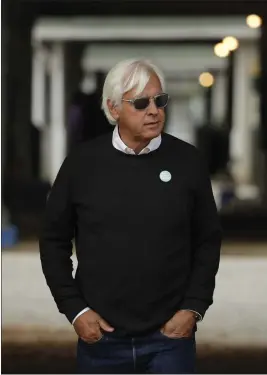  ?? THE ASSOCIATED PRESS – 2019 ?? HORSE RACING
Churchill Downs Inc. barred trainer Bob Baffert from entering horses at any of its tracks for two years after 2021Kentuc­ky Derby winner Medina Spirit failed a post-race drug test.