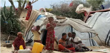  ??  ?? File photo of a displaced Yemeni family sit outside their tent at a make-shift camp for displaced people where they are taking shelter in the Haradh area, in the northern Abys district of Yemen’s Hajjah province.