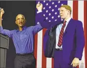  ?? David Dermer Associated Press ?? FORMER PRESIDENT OBAMA campaigns with Richard Cordray, who is in an increasing­ly nasty race for Ohio governor against Republican Mike DeWine.