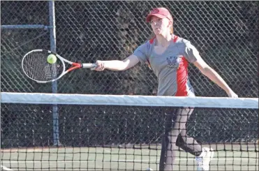  ?? Scott Herpst ?? LFO’s Julie Shore hits a forehand during the No. 1 singles match against Coahulla Creek last week. Shore and the Lady Warriors went on to score a 4-1 win over the Lady Colts.