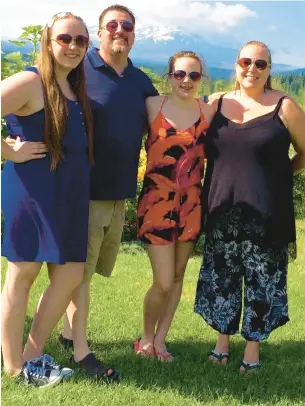  ?? GROBMEIER FAMILY PHOTO ?? Sam, from left, Frank, Maddie and Cyndi Grobmeier, of Frankfort, pose for a 2019 photo. A new law will honor Maddie. Maddog’s Law will make it easier for hunters applying for licences to donate their organs.