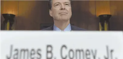 ?? AP FILE PHOTO ?? ON HIS OWN: FBI Director James B. Comey reportedly went against the wishes of the Justice Department when he alerted Congress to a new batch of emails related to the agency’s probe of Hillary Clinton.