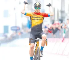  ?? - AFP photo ?? Team Bahrain rider Slovenia’s Jan Tratnik celebrates as he crosses the finish line to win in the 16th stage of the Giro d’Italia 2020 cycling race.