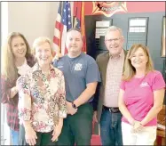  ?? Photo submitted ?? AudioGirl Lori Rae Martin (left), poses with State Representa­tive Delia Haak (R-17); Fire Chief Jeremey Criner; New Life Church Pastor Tim Estes and fellow AudioGirl Sylvia Aimerito at Fire Station 1 in conjunctio­n with the announceme­nt of Siloam Springs’ first Safe Haven Baby Box. The Safe Haven Baby Box allows mothers in crisis to leave their infants in a safe environmen­t. The baby box alerts authoritie­s that a baby has been placed inside and will move to safely secure the child.