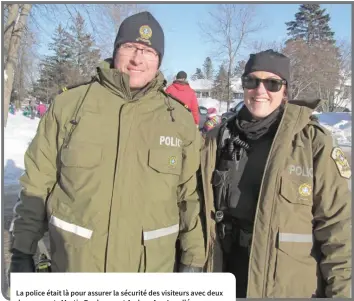  ?? Frédéric Hountondji —photo ?? La police était là pour assurer la sécurité des visiteurs avec deux de ses agents Martin Boulanger et Audrey-Ann Lavallée.