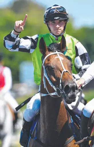  ?? Picture: AAP IMAGE ?? Jockey Lee Magorrian on Exoteric after winning at the Gold Coast.