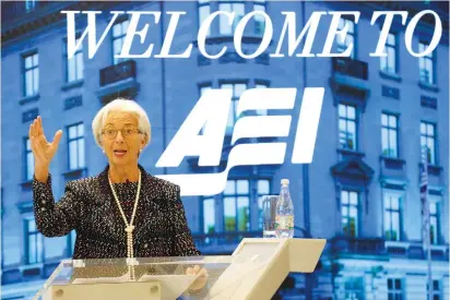  ?? (Joshua Roberts/Reuters) ?? INTERNATIO­NAL MONETARY FUND Managing Director Christine Lagarde speaks at the American Enterprise Institute in Washington yesterday.