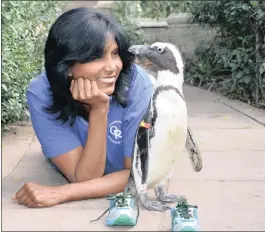  ??  ?? ABOVE: Ramini Naidoo with Nemo the Penguin.