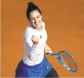  ?? CHRISTOPHE ENA AP ?? Italy’s Martina Trevisan celebrates a point in her French Open victory over Netherland­s’ Kiki Bertens.