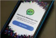  ?? THE ASSOCIATED PRESS ?? Facebook’s Messenger Kids app is displayed on an iPhone in New York. Facebook is adding a “sleep” mode to its Messenger Kids service so parents can limit how much time children spend on it.