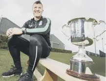  ??  ?? 0 Hibs coach Grant Murray with the Youth Cup yesterday.