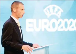 ?? AFP ?? UEFA president Aleksander Ceferin speaks at an event to launch the logo for Euro 2020. The delayed tournament will see matches hosted in 13 cities across Europe this year.