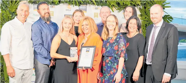  ?? Picture / Supplied ?? Celebratin­g at the presentati­on of the New Zealand Biosecurit­y Māori Award in Auckland are members of the Te Arawa Lakes Trust team.