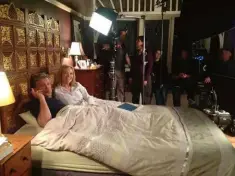  ??  ?? Left: Erik and Rebecca ready to film in their on-set bedroom. The location quickly became a place for the pair, as well as the cast, to relax and bond around filming. Those strong cast ties have continued with the new Amazon series.