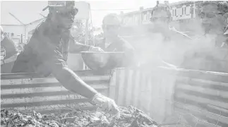  ?? Michelle Watson / CatchLight Photograph­y ?? Pitmaster Rodney Scott of Scott’s Bar-B-Que in Hemingway, S.C., will participat­e in the Nov. 6 event on the grounds of Underbelly, Hay Merchant and Blacksmith.