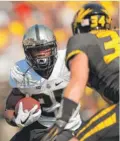  ??  ?? Purdue running back Tario Fuller rushed for 90 yards and a touchdown in a win against Missouri.
| GETTY IMAGES