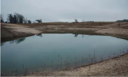  ?? Photograph: Tristan Spinski ?? A pond in Maine contaminat­ed with PFAS, also known as “forever chemicals”. These toxins, found in consumer products and manufactur­ing byproducts, cause a range of adverse health effects.