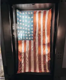  ??  ?? The stars on this American flag were sewn back on by PoWs after they were rescued. It’s on display at the National Museum of the Pacific War.