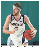  ?? KIM KLEMENT/USA TODAY SPORTS ?? Gonzaga forward Drew Timme drives to the basket against Auburn on Friday.