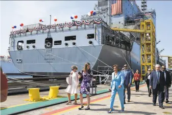  ?? Denis Poroy / Associated Press ?? Speaker Nancy Pelosi, DSan Francisco, leaves a christenin­g ceremony for the Navy ship John Lewis in San Diego. Saturday was the first anniversar­y of the civil rights leader’s death.