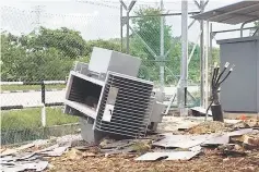  ??  ?? What’s left of a vandalised transforme­r at a Sesco substation in Muara Tebas.