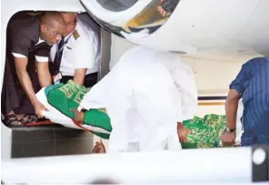  ??  ?? Body of late Isyaku Rabi’u arrived Aminu Kano Internatio­nal Airport around 7am on Friday and was received by Kano State governor, Abdullahi Umar Ganduje and others Photos: Sani Maikatanga