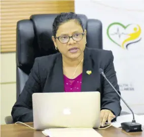  ?? (Photo: JIS) ?? Chief Medical Officer Dr Jacquiline Bisasor-mckenzie addressing the Ministry of Health and Wellness‘ weekly virtual COVID Conversati­ons on Thursday.