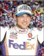  ?? JOHN RAOUX / AP ?? Denny Hamlin, celebratin­g in Victory Lane after winning the NASCAR Daytona 500, said he was unaware of Ryan Newman’s crash at the time.