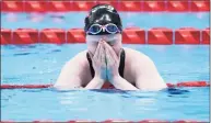  ?? Yuichi Yamazaki / Getty Images ?? Colleen Young of Team United States reacts after winning the silver medal in the Women’s 200m Individual Medley - SM13 Final at the Tokyo 2020 Paralympic Games at Tokyo Aquatics Centre on Monday in Tokyo.