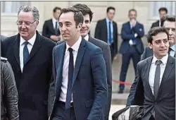  ??  ?? Jean-Marie Girier (centre) fait son entrée à l’Elysée le 14 mai 2017.