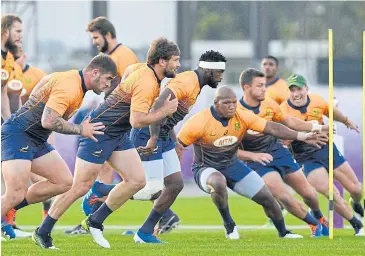  ?? AP ?? South Africa’s Siya Kolisi, with headband, and teammates train in Urayasu, near Tokyo yesterday.