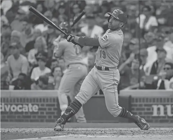  ?? JONATHAN DANIEL/GETTY IMAGES/FILES ?? Joey Votto’s numbers this season with the Cincinnati Reds are remarkable, leading the National League in on-base percentage, OPS and walks.