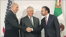  ?? AP PHOTO ?? U.S. Secretary of State Rex Tillerson, centre, smiles as Mexico’s Foreign Relations Secretary Luis Videgaray, right shakes hands with U.S. Homeland Security Secretary John Kelly at the Foreign Affairs Ministry in Mexico City.