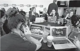  ?? JOE CAVARETTA/ SUN SENTINEL ?? Members of the March for our Lives organizati­on make calls and send emails at a phone bank get out the vote event in Parkland.