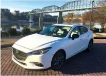  ?? STAFF PHOTO BY MARK KENNEDY ?? The 2018 Mazda 3 is a smart and sexy compact sedan.