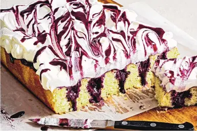  ?? SCOTT SUCHMAN/FOR THE WASHINGTON POST ?? This moist and fluffy vanilla cake is poked while still warm, and then filled with a slightly sweet blueberry sauce.