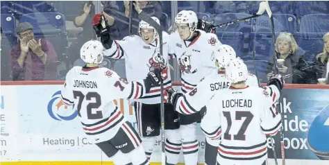  ?? JULIE JOCSAK/STANDARD STAFF ?? Philip Tomasino of the Niagara IceDogs celebrate his first OHL goal Thursday against the Mississaug­a Steelheads.