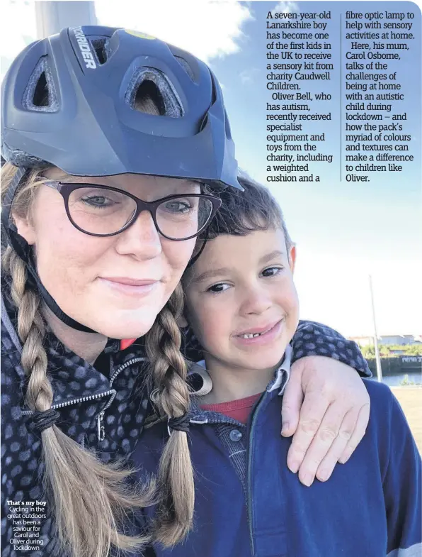  ??  ?? That’s my boy Cycling in the great outdoors has been a saviour for Carol and Oliver during lockdown