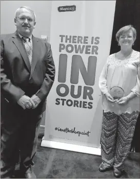  ?? Contribute­d photo ?? Greg and Vickie Chupp are given the DFCS Division Director’s Award for their service to older youth in foster care May 15 at the 2017 Foster Caregivers of the year awards luncheon.