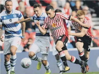  ??  ?? Sunderland’s George Honeyman tries to get the better of QPR’s Josh Scowen last week.